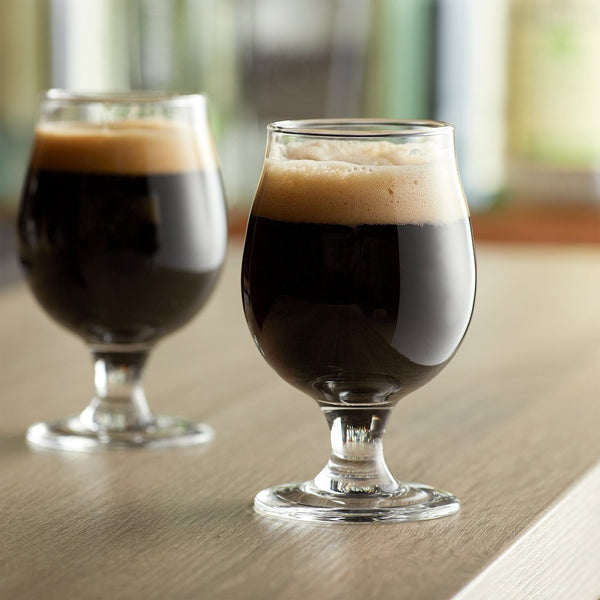 Why do we drink stouts from tulip-shaped beer glasses?